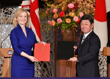 International Trade Secretary Liz Truss and Japan's Foreign Minister Motegi Toshimitsu